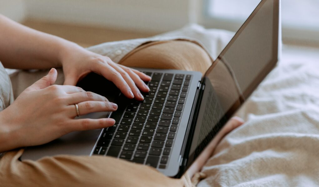 Stock image of person on laptop computer